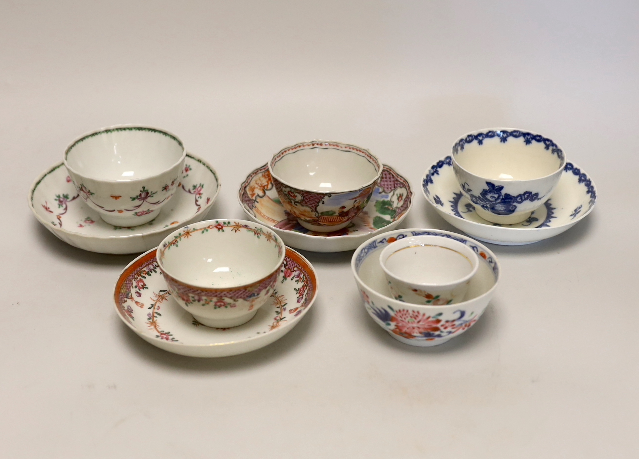 Three 18th century Chinese famille rose tea bowls and matching saucers, a Caughley teabowl and saucer and a single tea bowl and smaller tea bowl